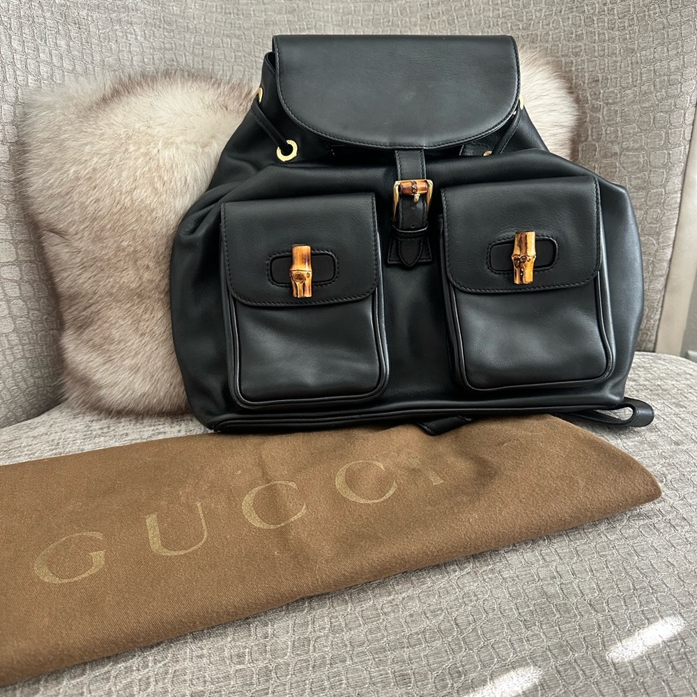 Authentic Gucci black leather backpack with bamboo accents!